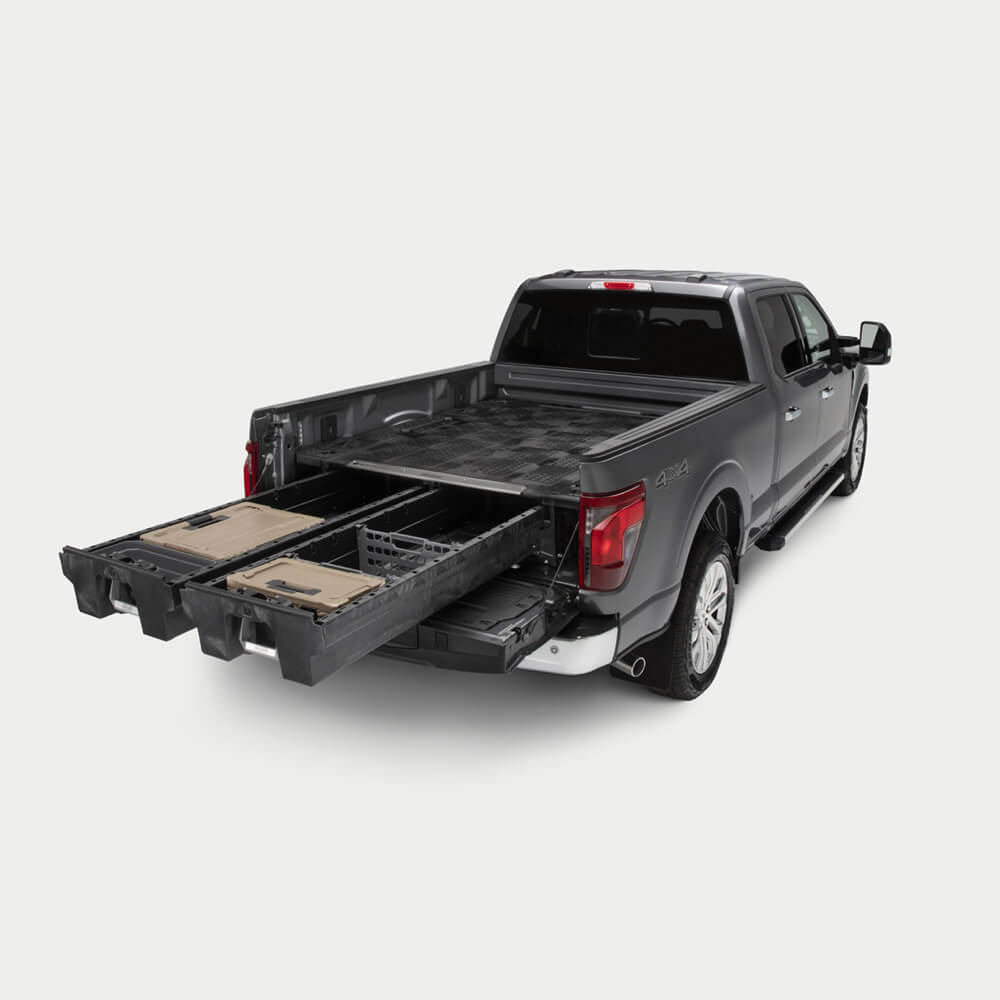 A full-size truck with a Drawer System extended in the bed.
