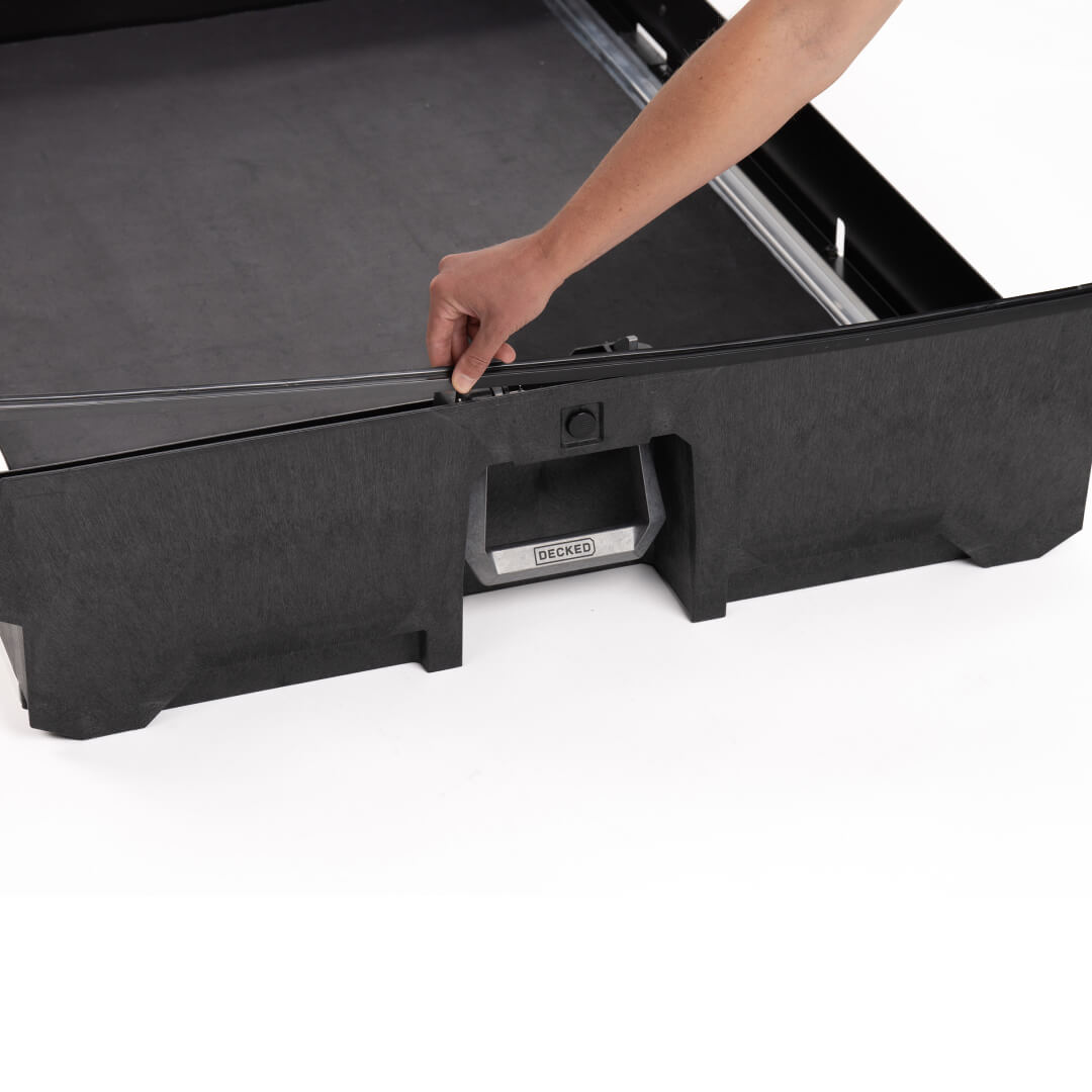 Weatherstrips being installed on Midsize Drawer system