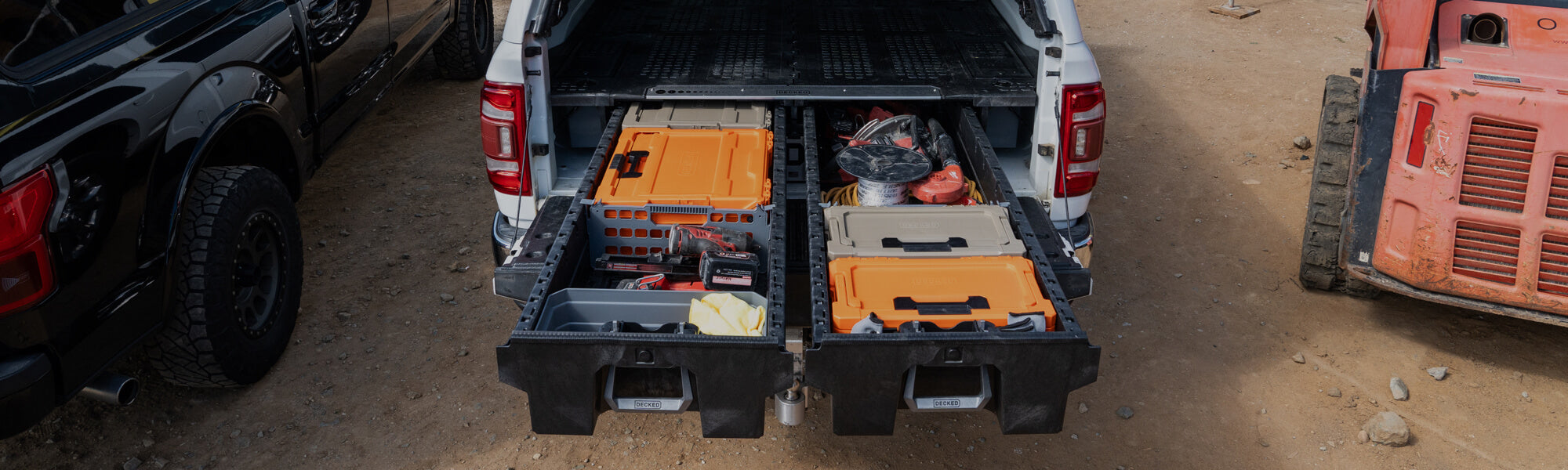 A DECKED Drawer System loaded with well-organized tools stored in the drawer and in D-co cases for efficient and safe storage.