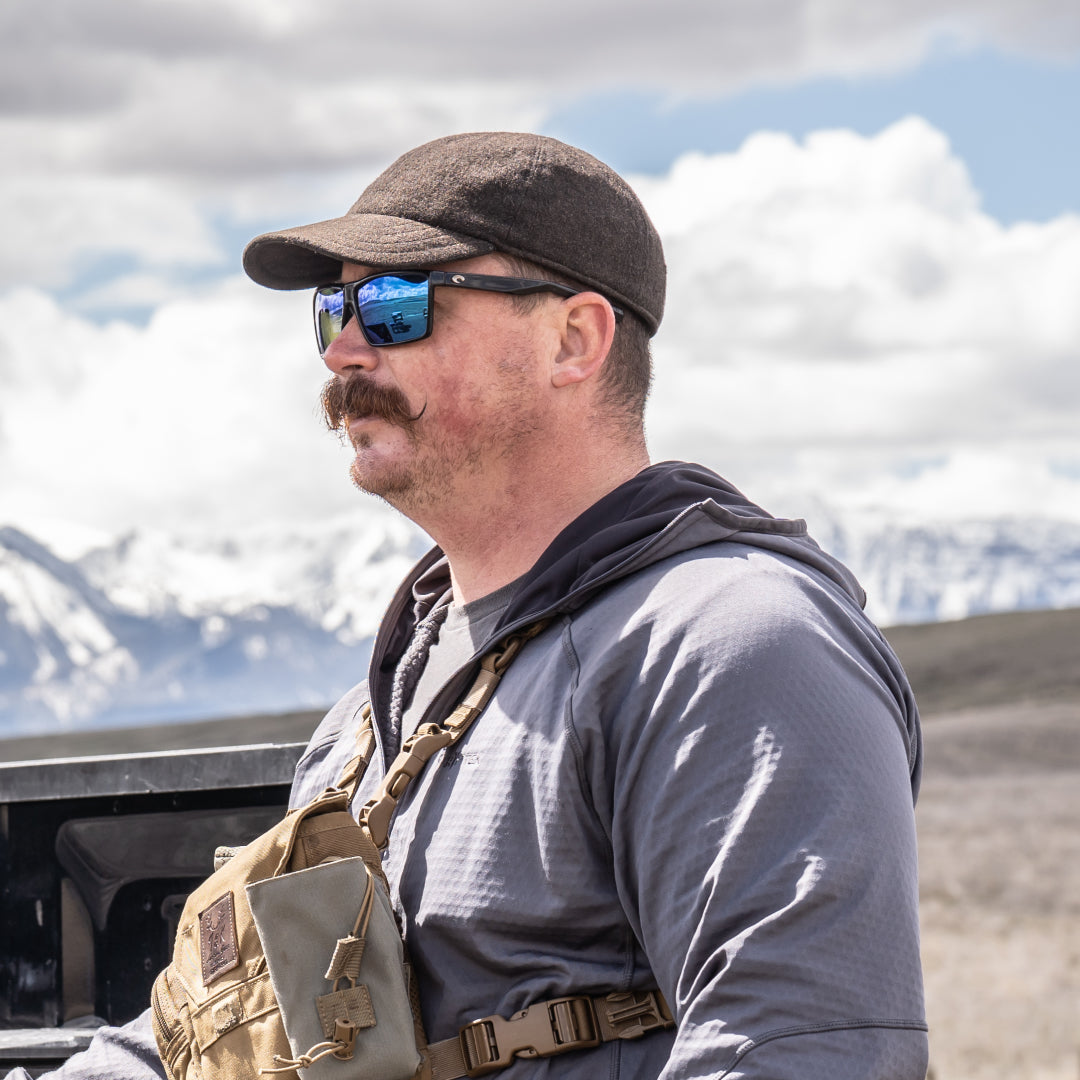 James Nash at the range with the mountains in the background.