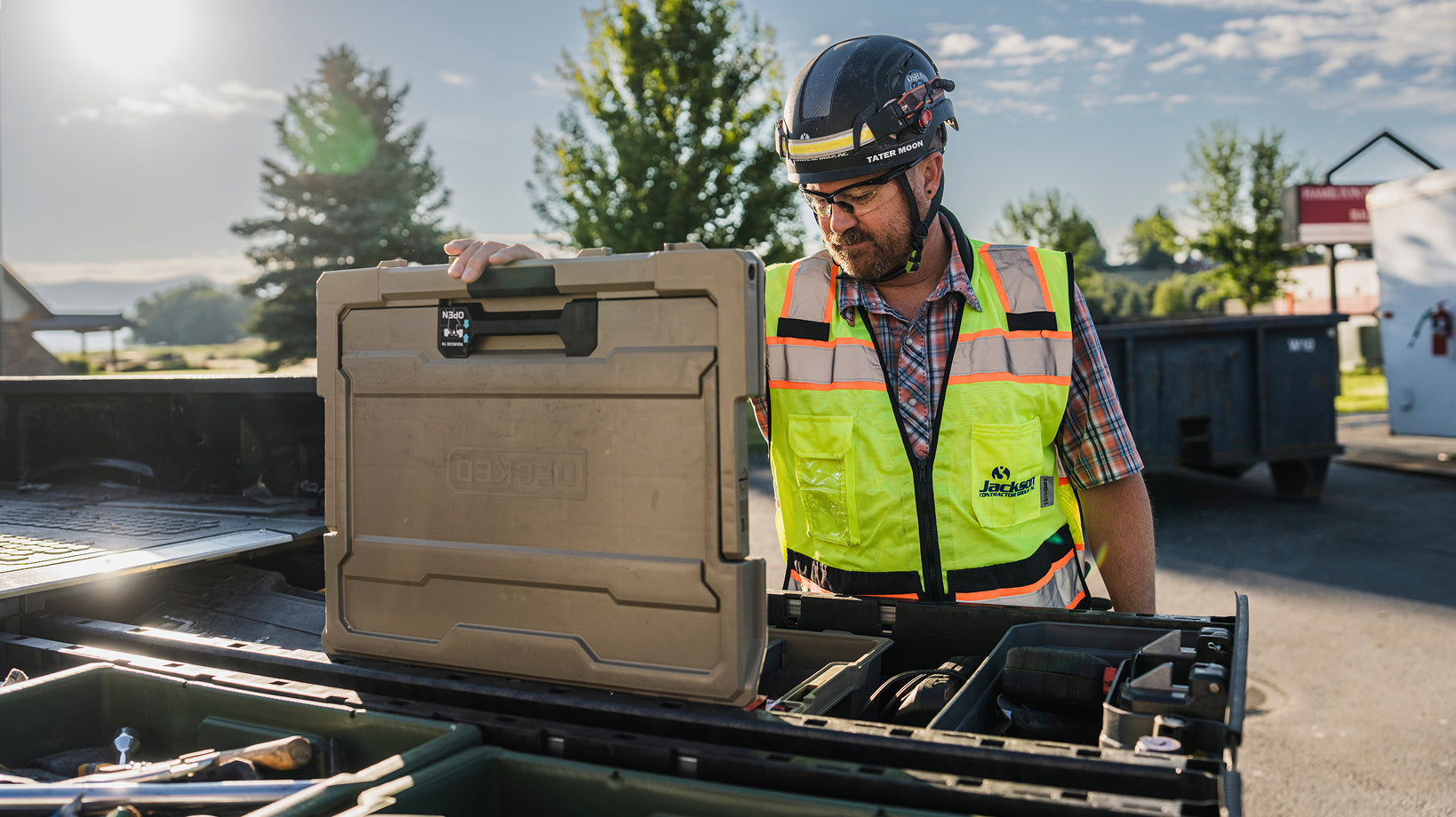 Construction worker opening a DECKED halfrack stored inside a Drawer System.