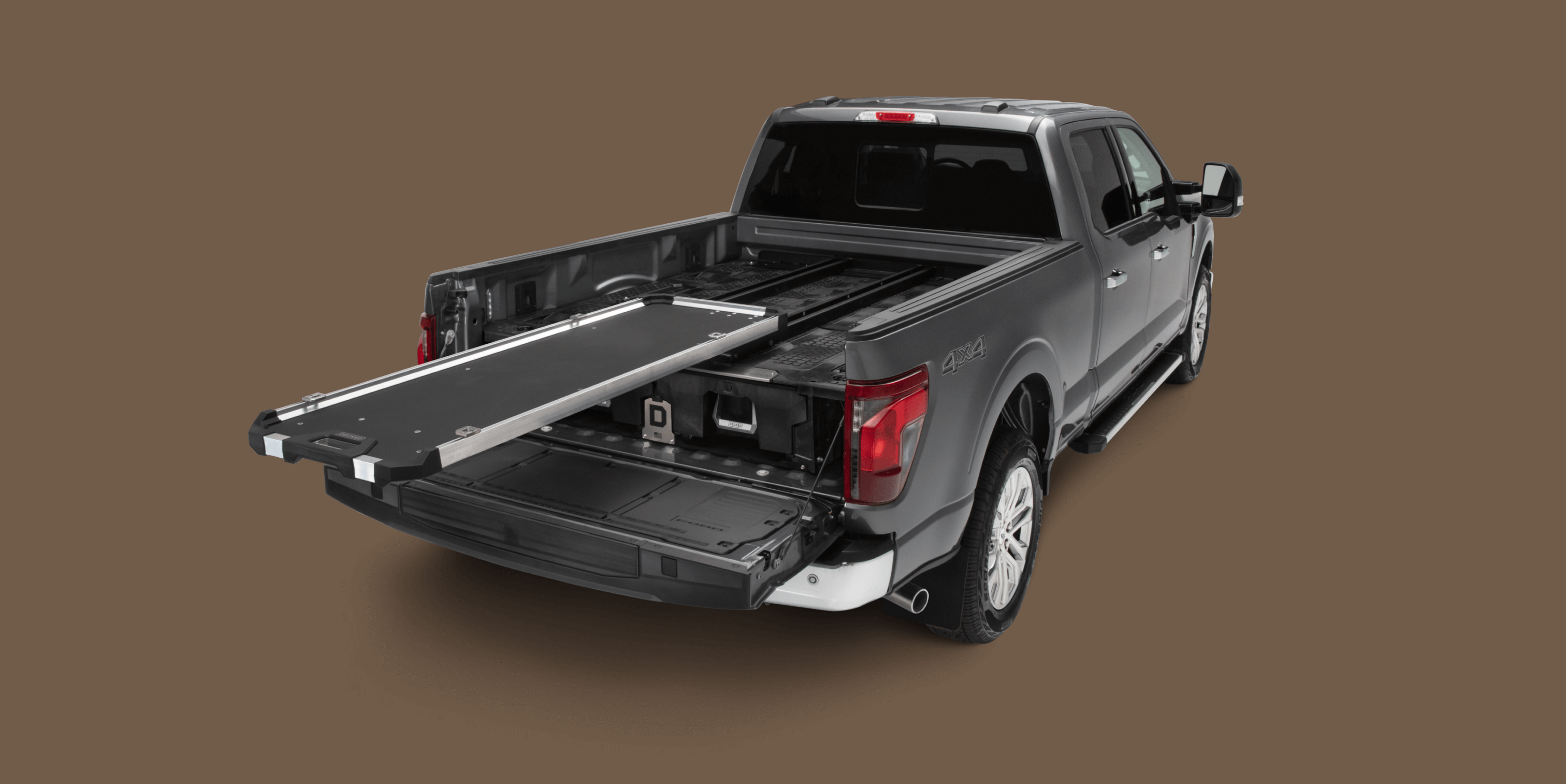 A fully extended CargoGlide 600 mounted on a Drawer System in a full-size truck bed.