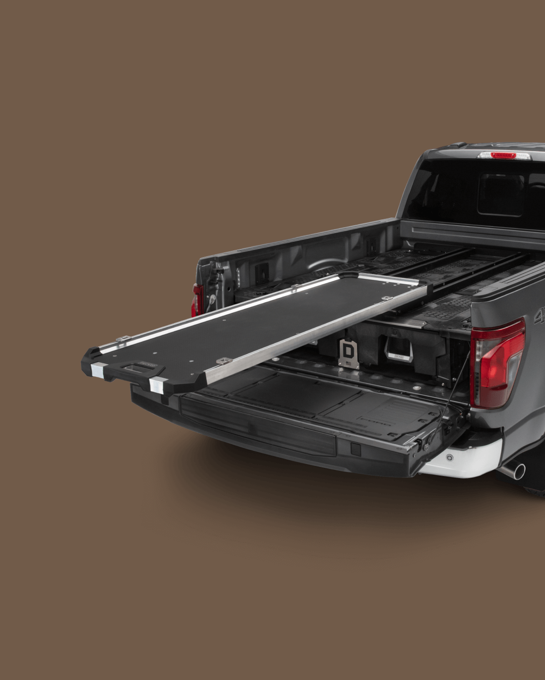 A fully extended CargoGlide 600 mounted on a Drawer System in a full-size truck bed.