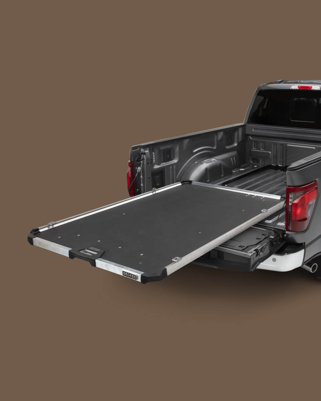 A fully extended CargoGlide in a full-size truck bed.