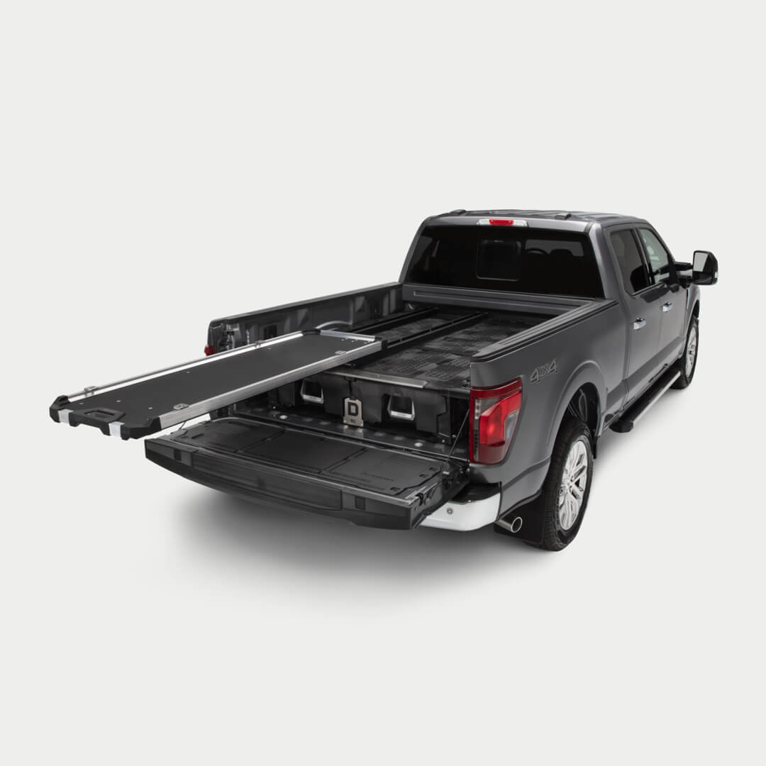 [DCG600-6324, DCG600-7324]
A studio shot of a fully extended CargoGlide 600 mounted on a Drawer System in a full-size truck bed.