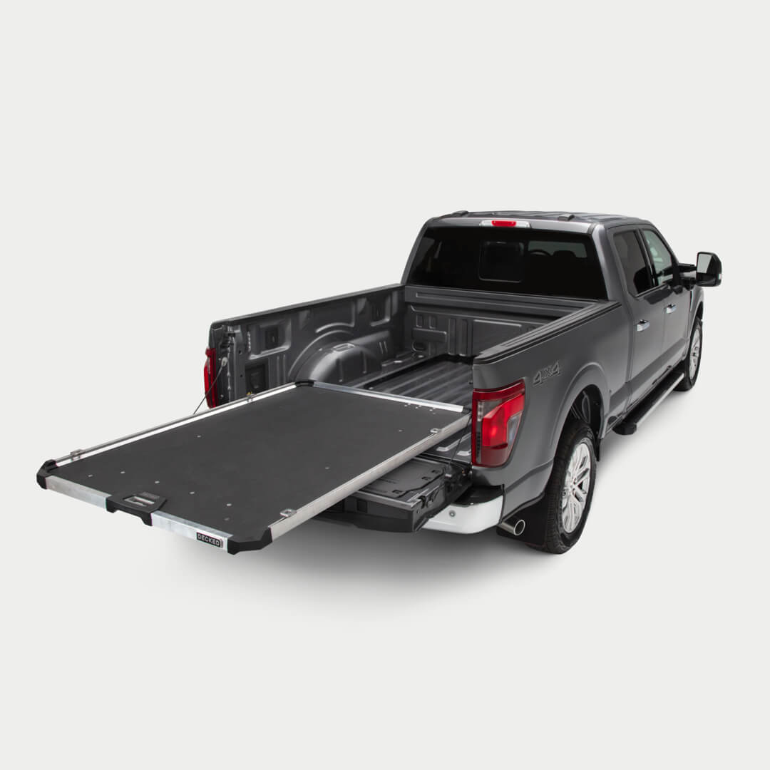 A studio shot of a fully extended CargoGlide in a full-size truck bed.