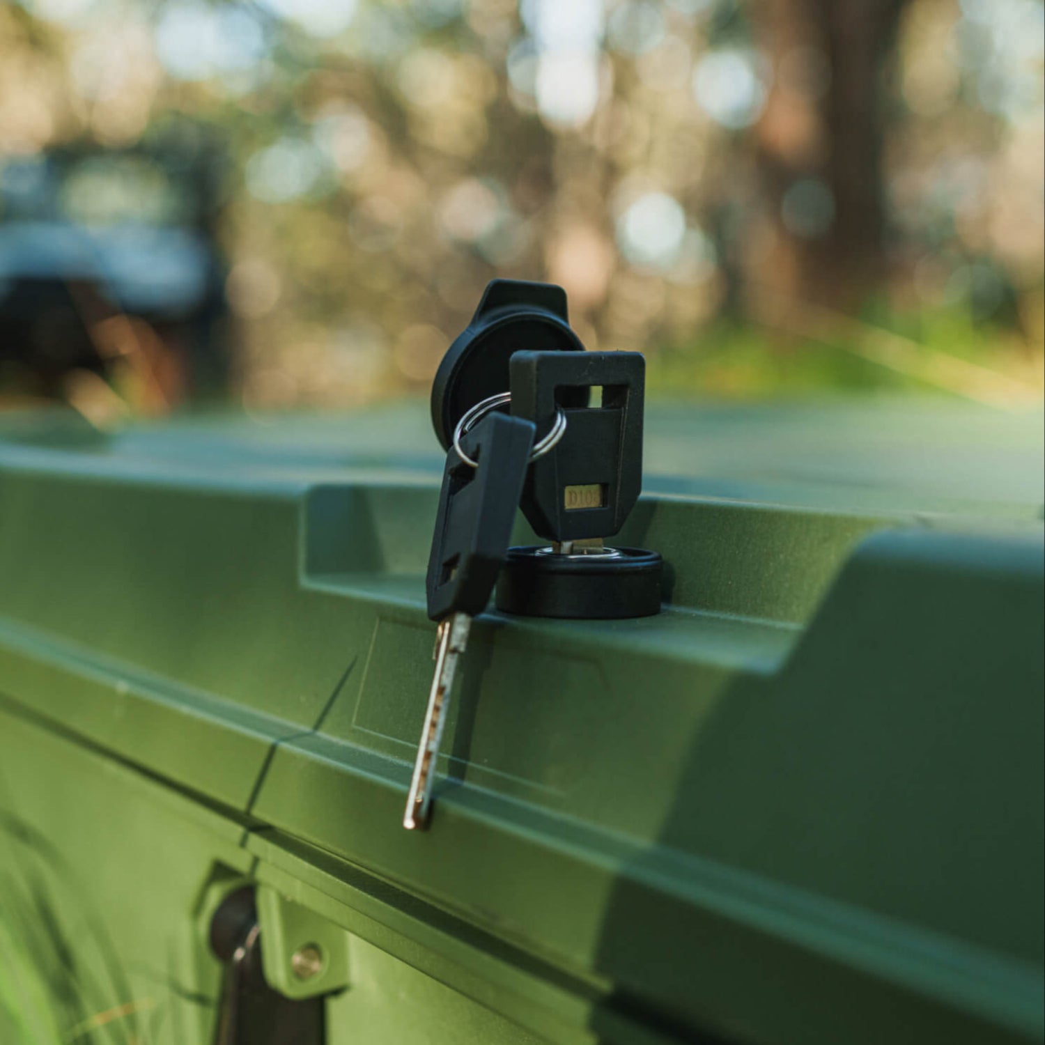 A close-up of the Honcho 80 lock and key that keeps your most valuable items secure.