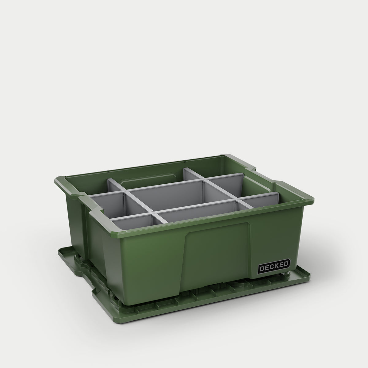 One green DECKED Payloader bin with grey POD divider system inside of it.