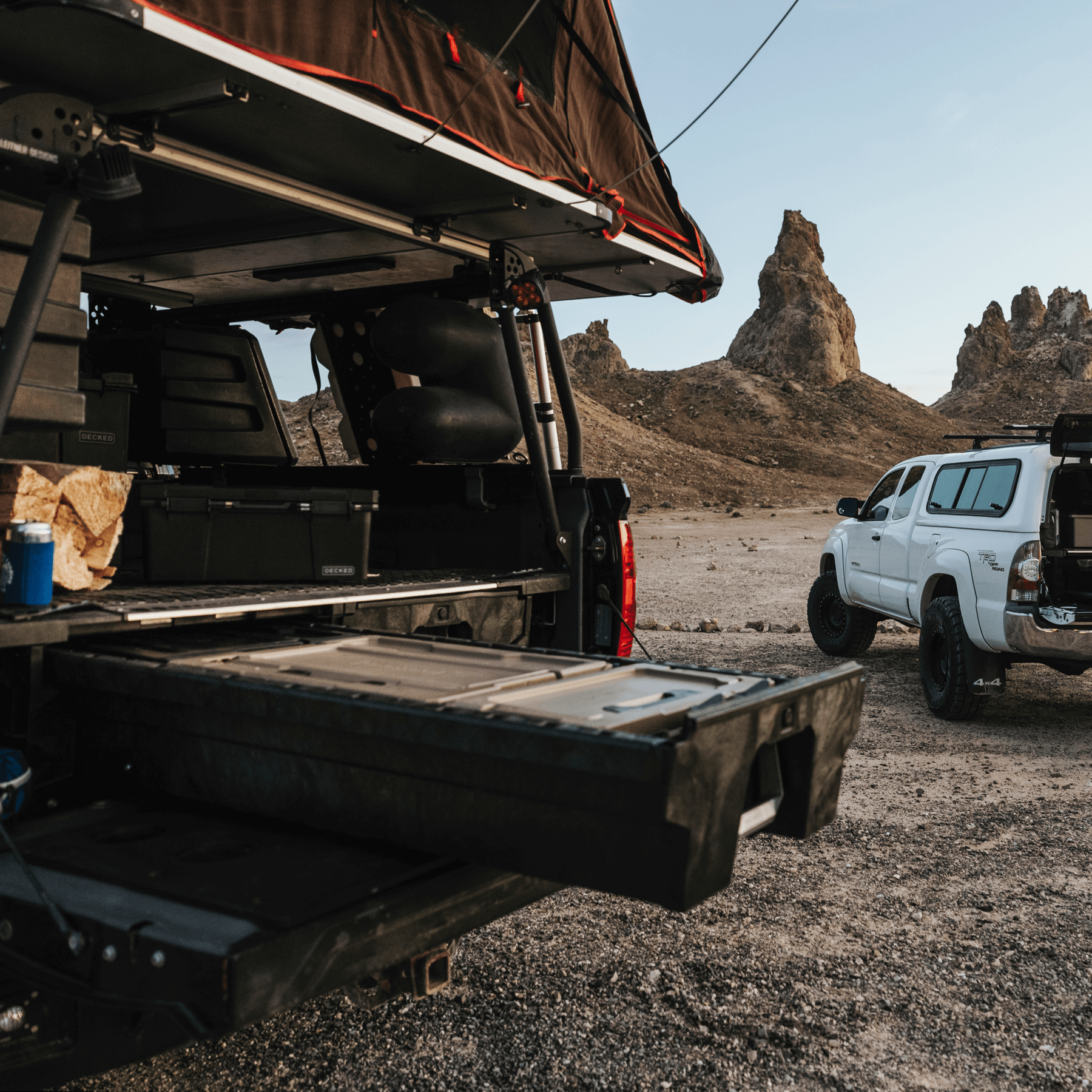 Trucks in the desert with Drawer Systems open.