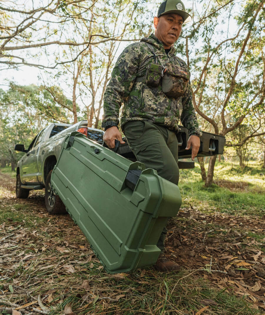 DECKED ambassador, Justin Lee, retrieving his Ranger Green Honcho 80 from his DECKED Drawer System.