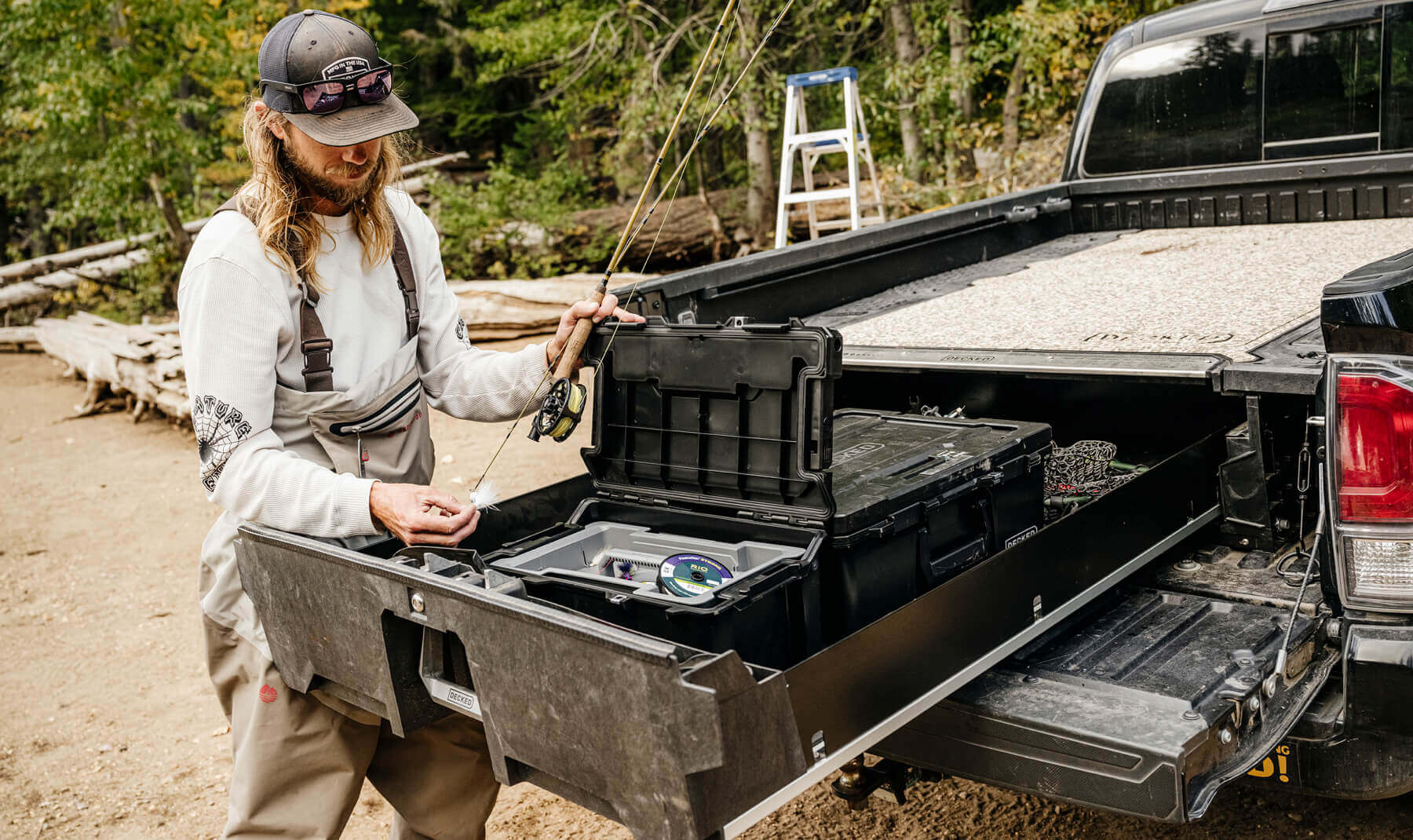 DECKED ambassador, David Gravette, retrieving his fishing gear from his Black Sixer inside of his Drawer System.