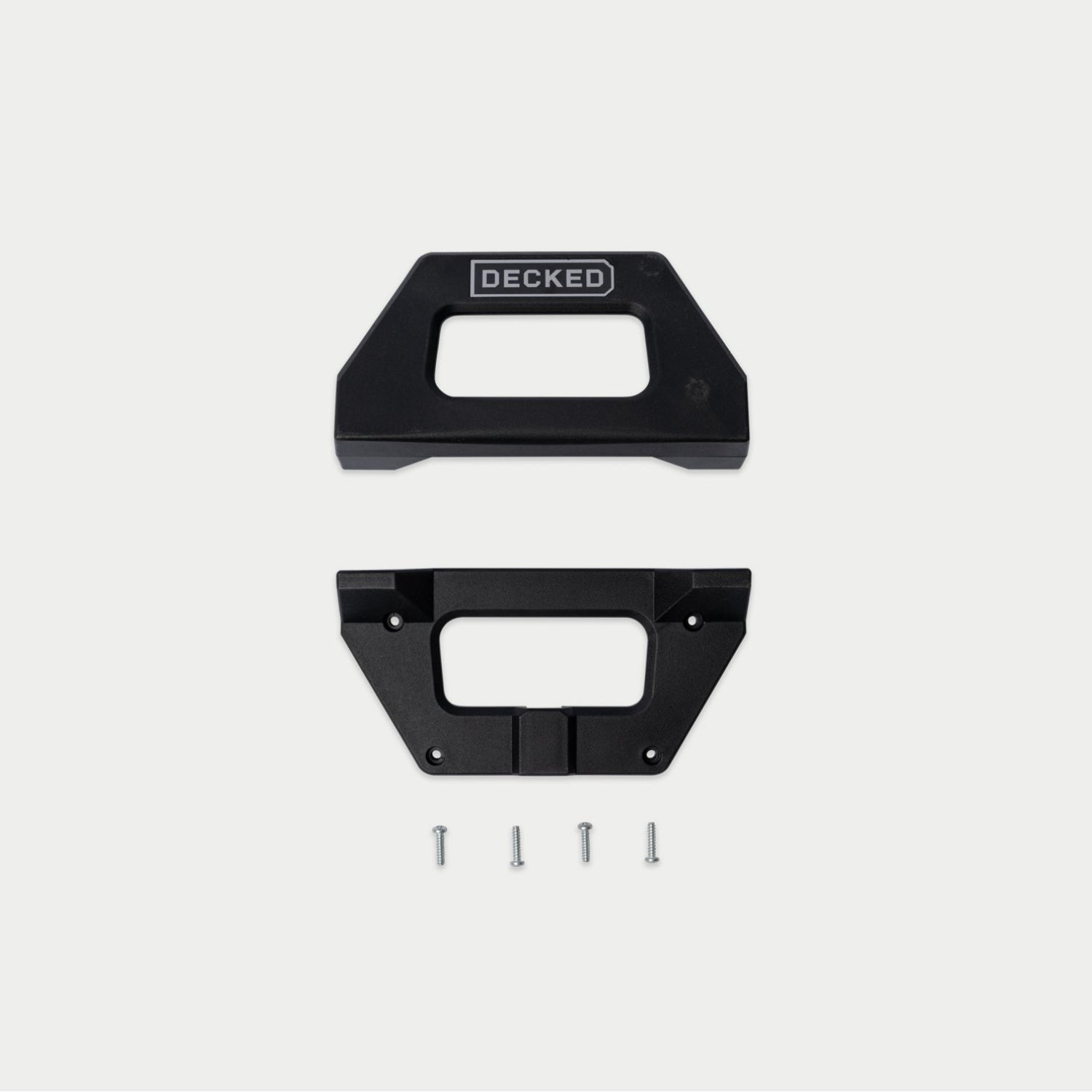 [W-DCG-HANDLE-SURROUND-KIT] Two black metal boat deck mounting brackets with four silver screws, shown on a light gray background. The top bracket has a white 'DECKED' logo.