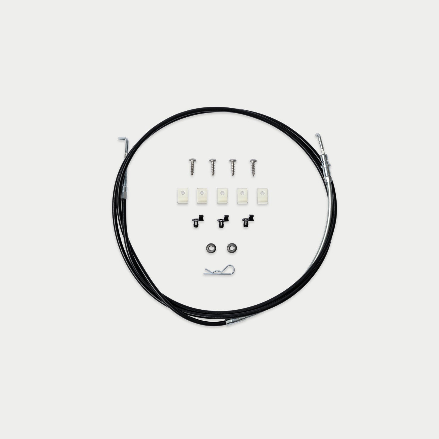 A cable assembly kit with a black cable coiled in a circle, shown with its mounting hardware including screws, clips, washers, and a small hook on a light gray background.
