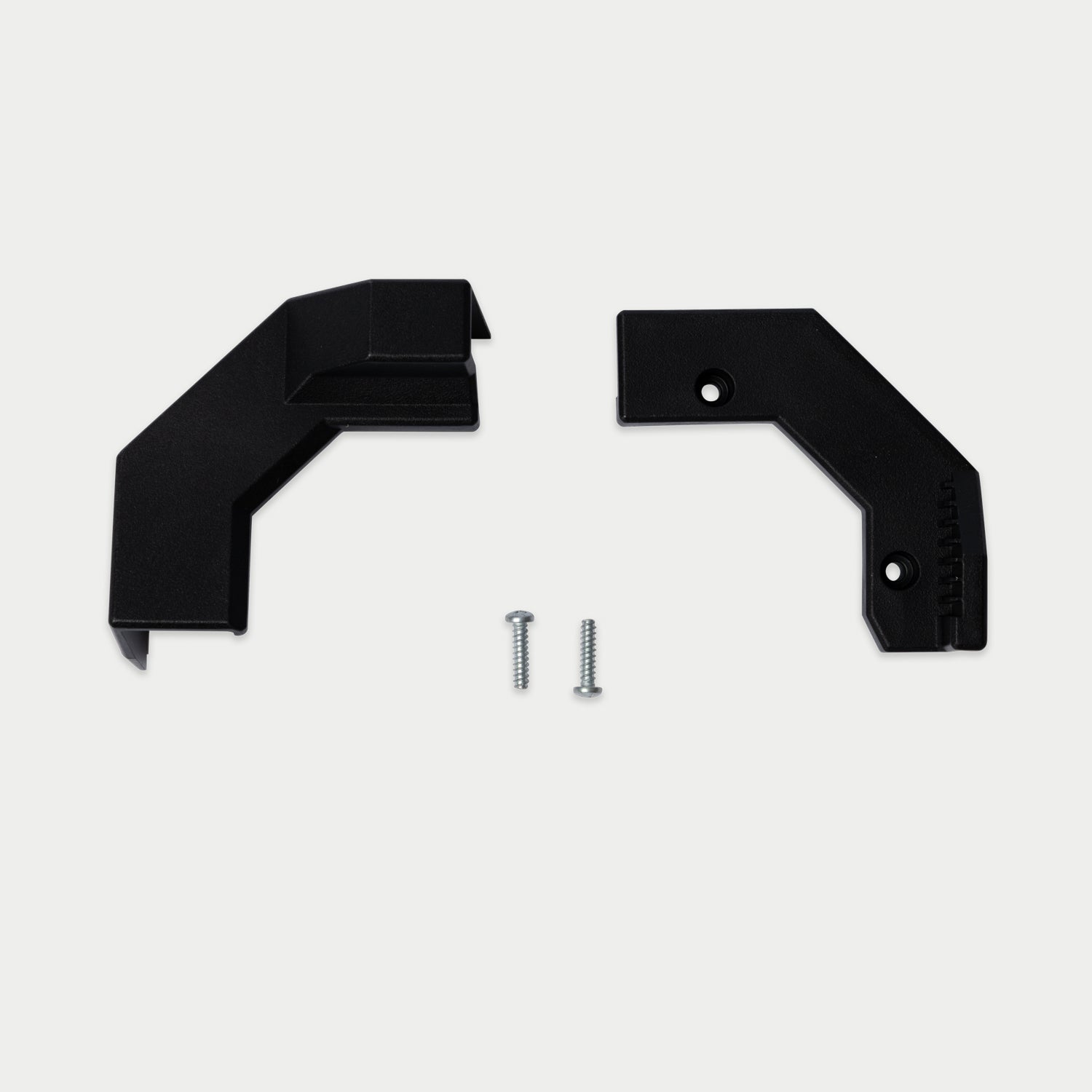 [W-DCG-TG-DS-CORNER-KIT] A pair of black plastic mounting brackets with two silver screws, shown on a light gray background.