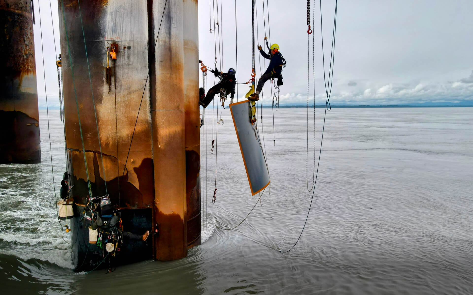 Jackson using his climbing skills working on an off-shore oil rig.