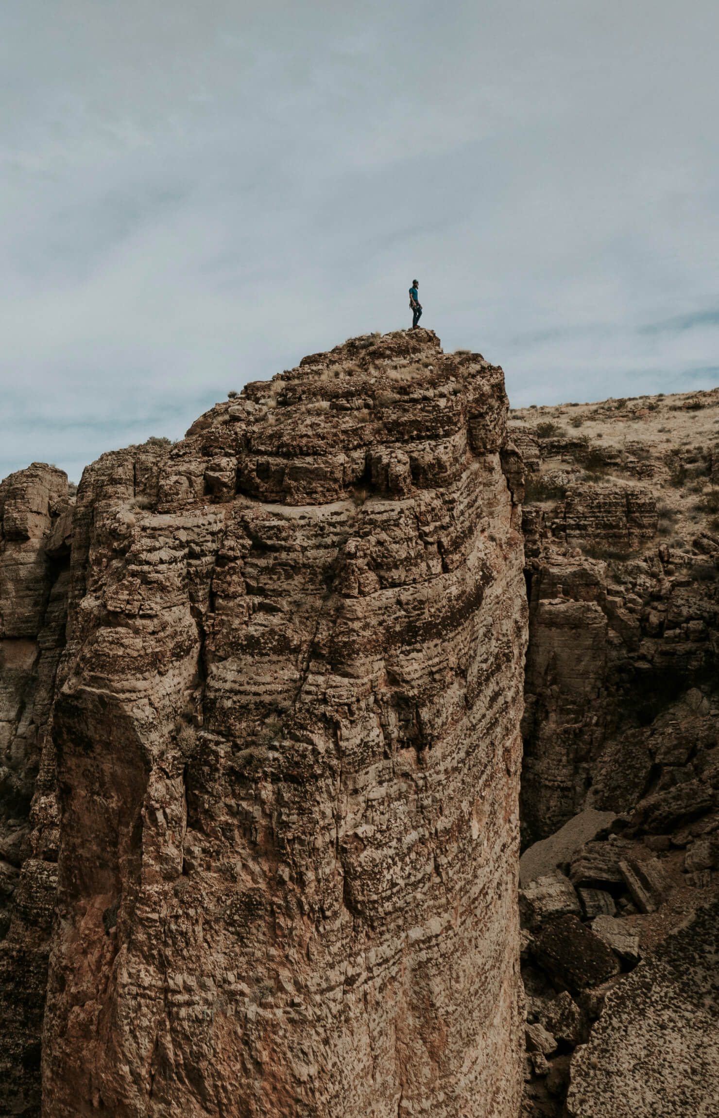 Jackson topping out on a climb in the desert.