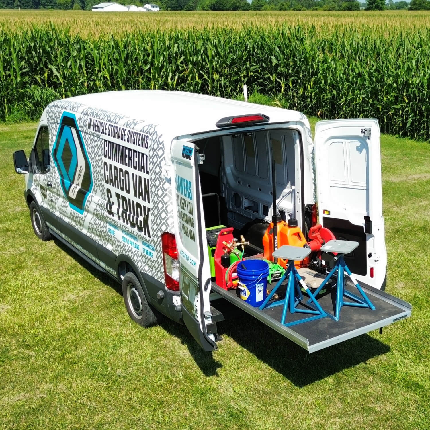 Cargo van with a CargoGlide pulled out containing gear