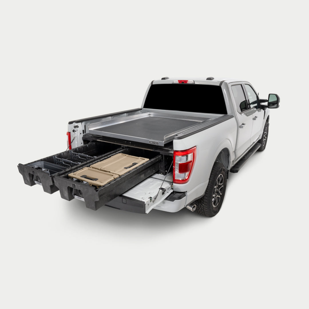 [CG1000-6348, CG1000-7348] Studio image of a CargoGlide on top of a Drawer System in a fullsize truck drawers open