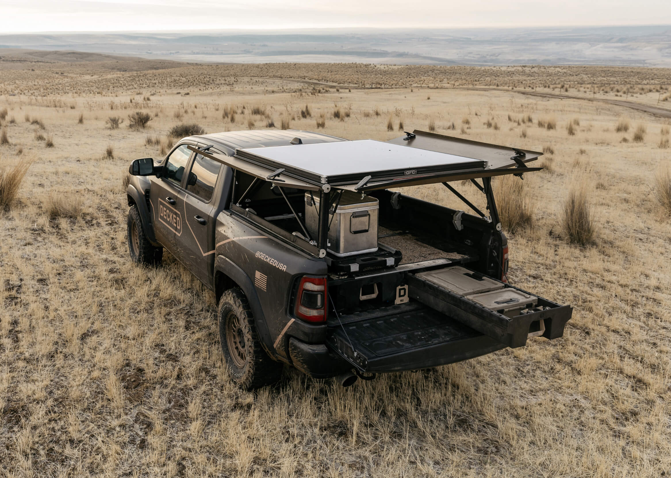 The TRX with its GoFast Camper open, revealing all of the DECKED gear inside.