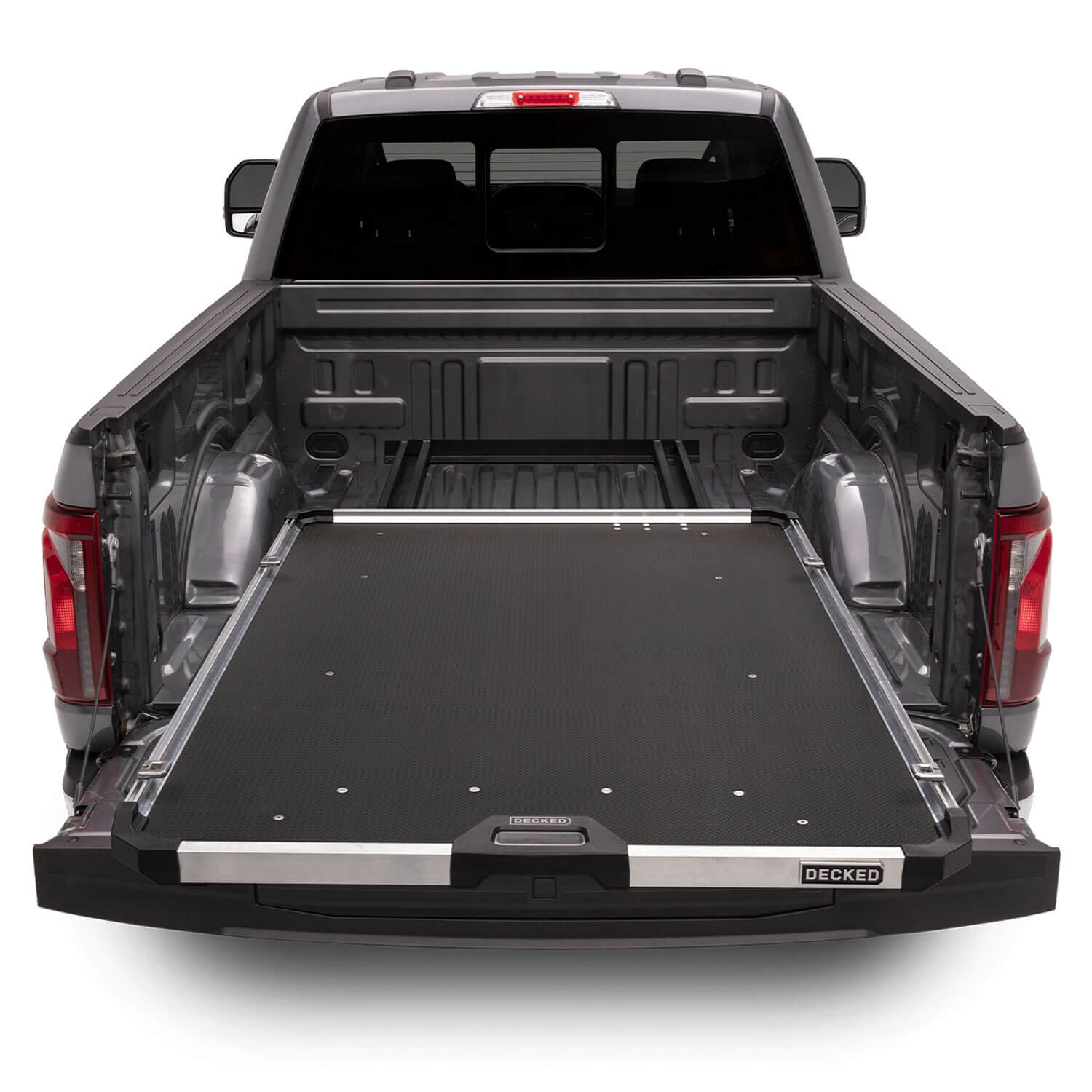 A 'DECKED' CargoGlide pulled out in the back of a Ford F-150. 