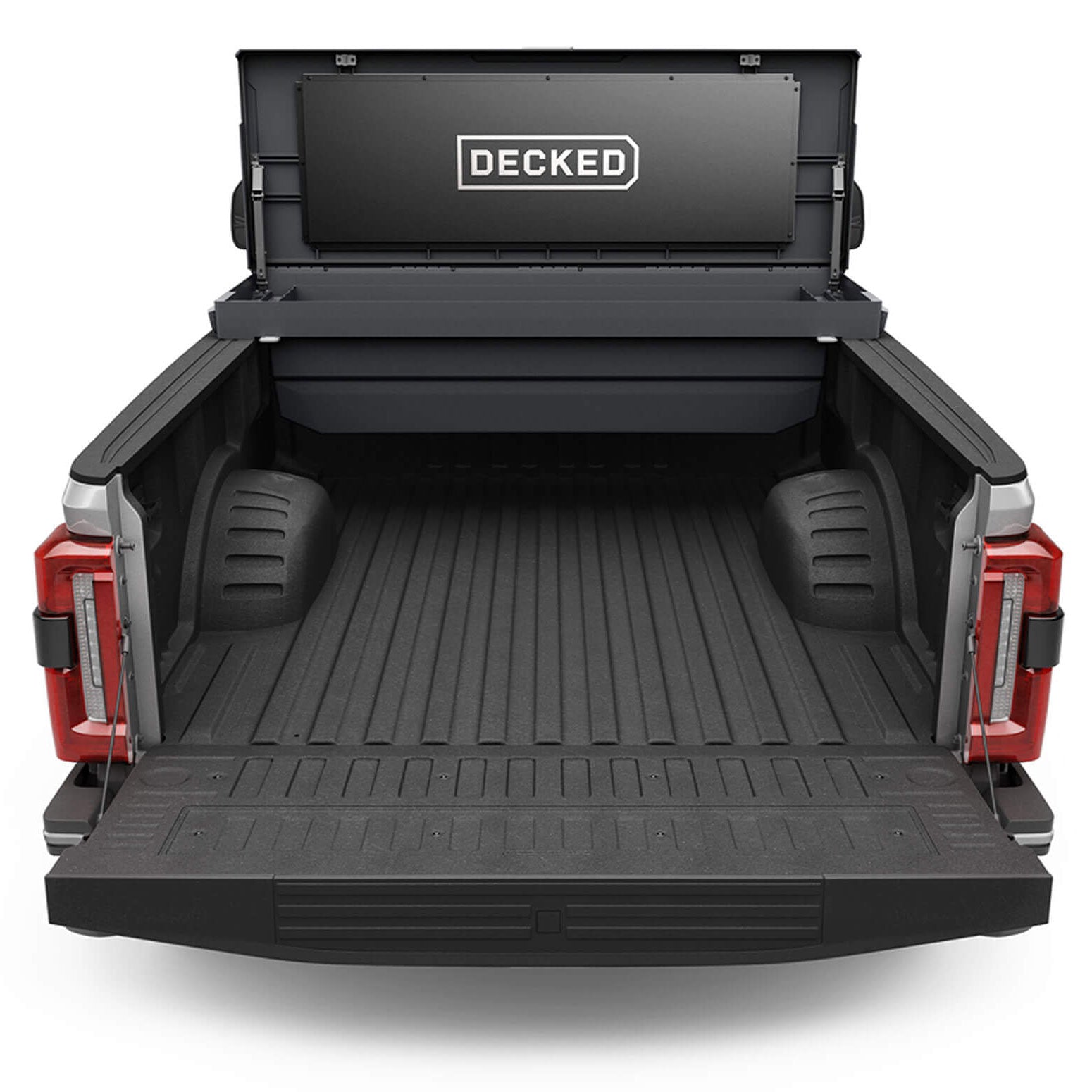 An open black Tool Box in the bed of a Ford F-350. 
