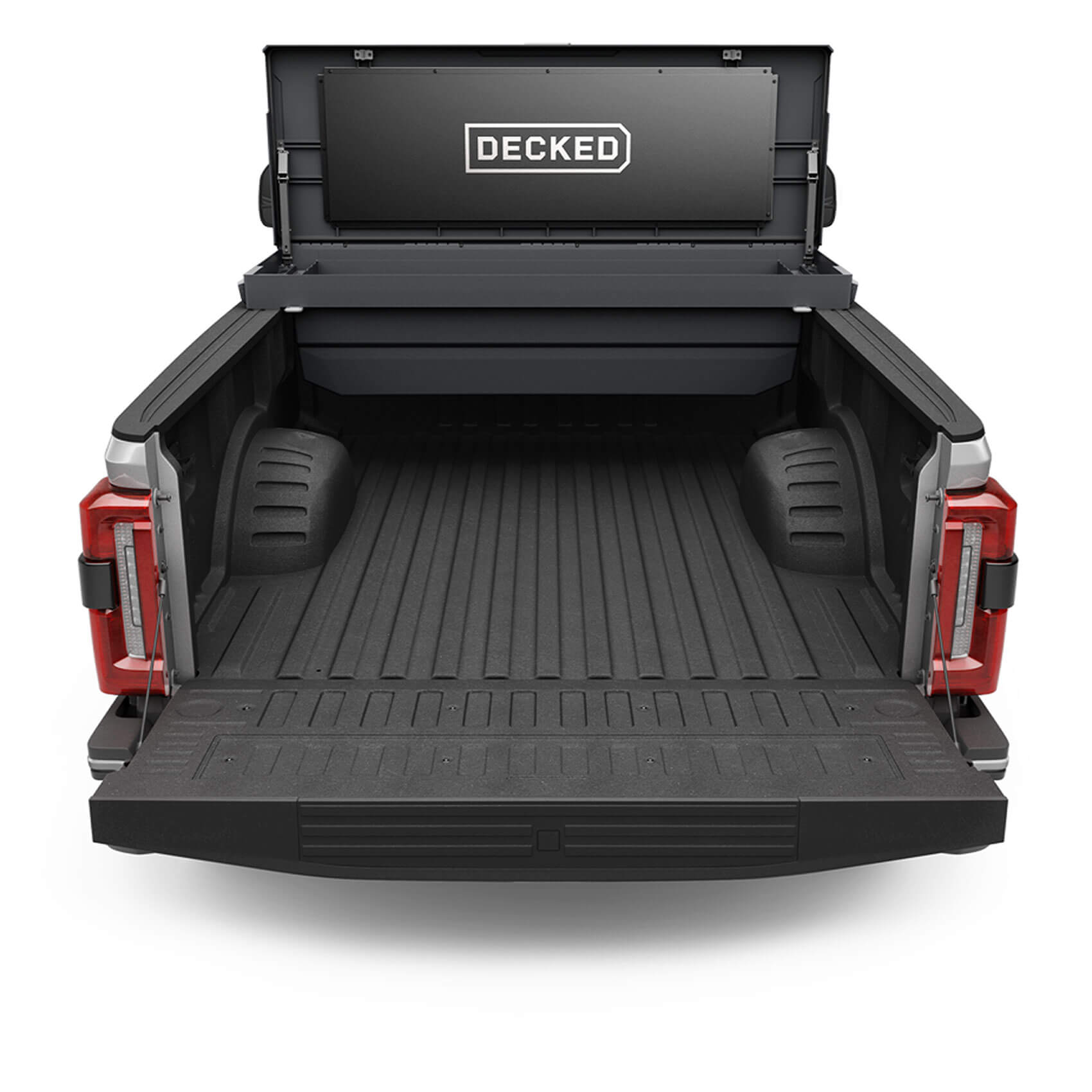 An open black tool box in the bed of a Ford F-350.