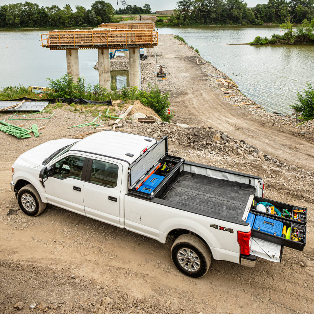 Overhead view of a Drawer System installed in an 8 foot truck with a DECKED Tool Box in the cabside gap