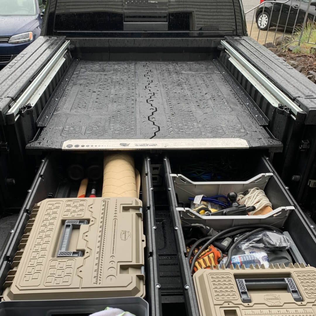 Overhead view of a Drawer system installed in the back of a RamBox truck with accessories