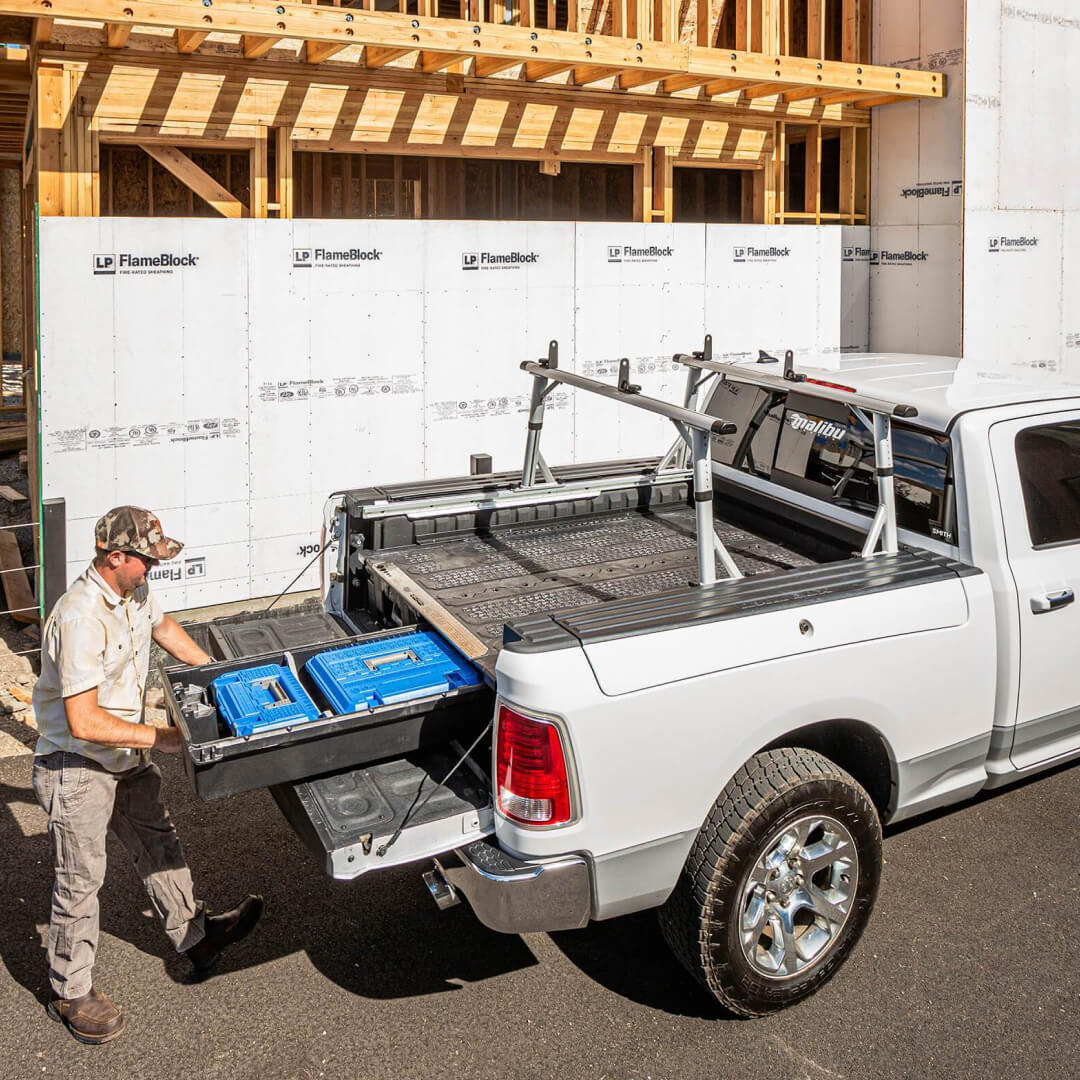 Man opening a Drawer System at a construction site