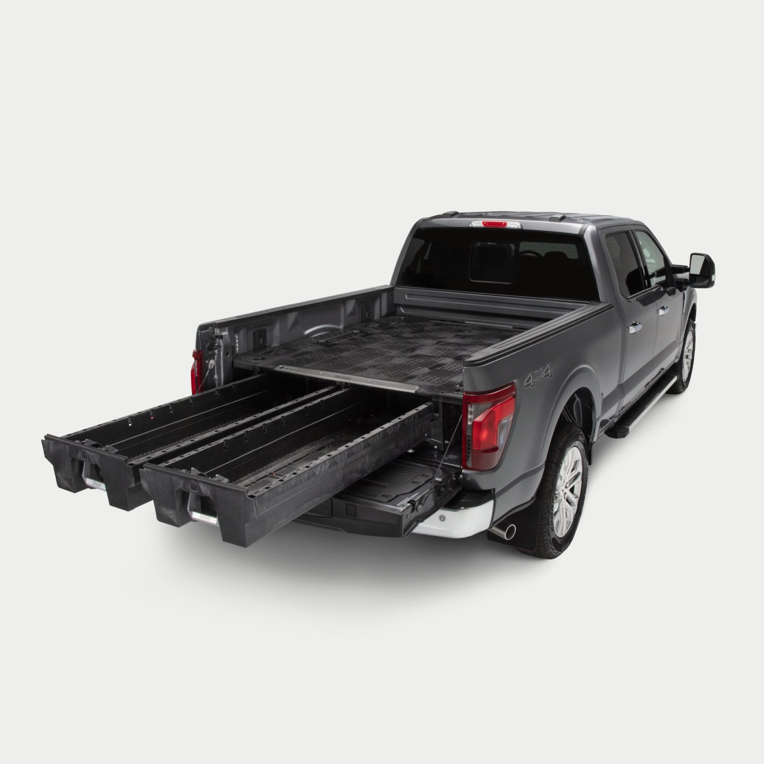 Angled image of a full-size truck with a Drawer System in the bed with drawers fully extended.