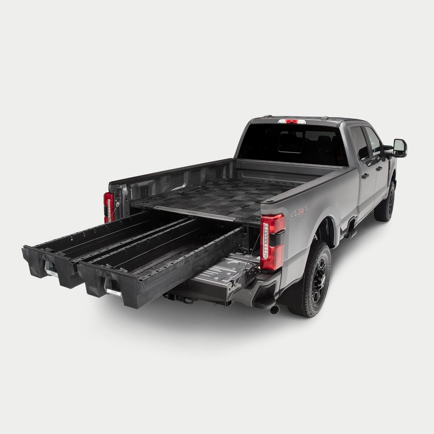 Angled image of a super duty truck with a Drawer System in the bed with drawers fully extended.