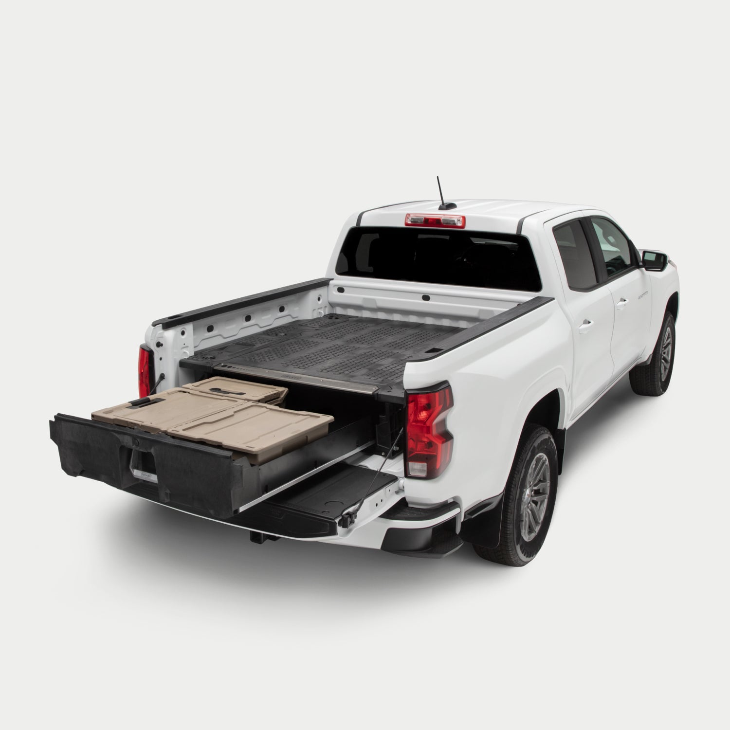 Angled image of a midsize truck with a Drawer System in the bed with its drawer fully extended.