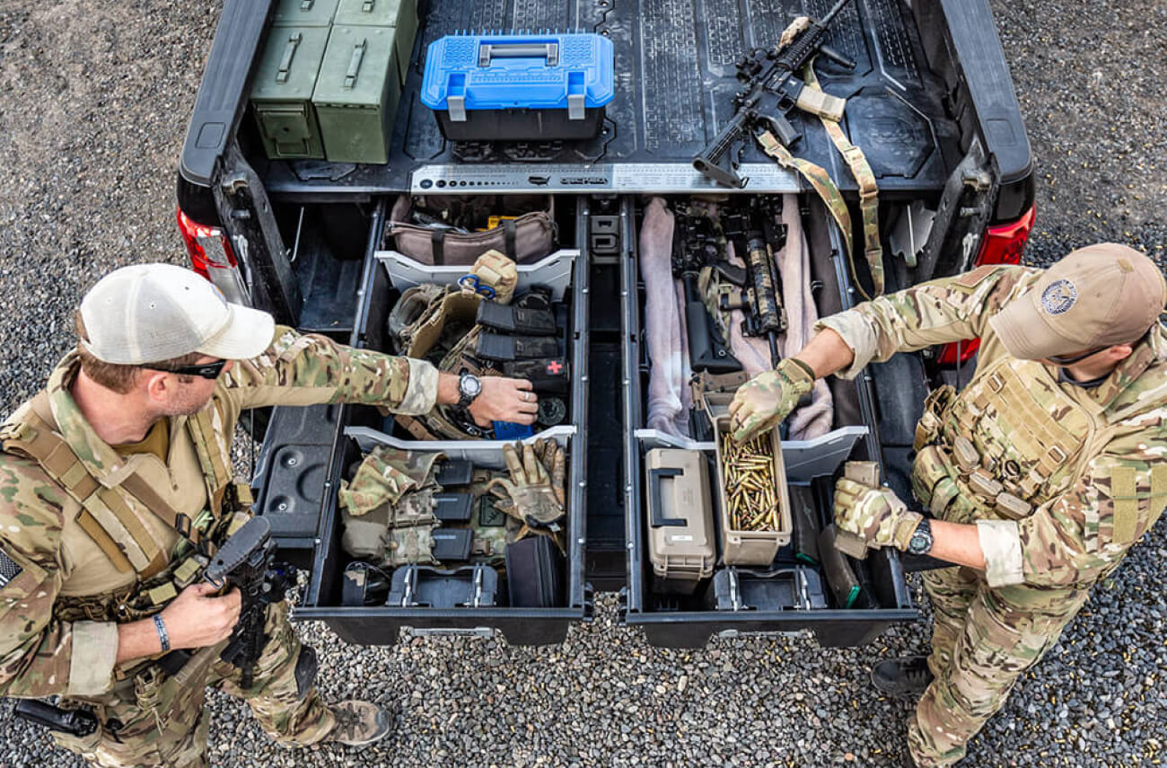overhead view of military gear stored in a drawer system 