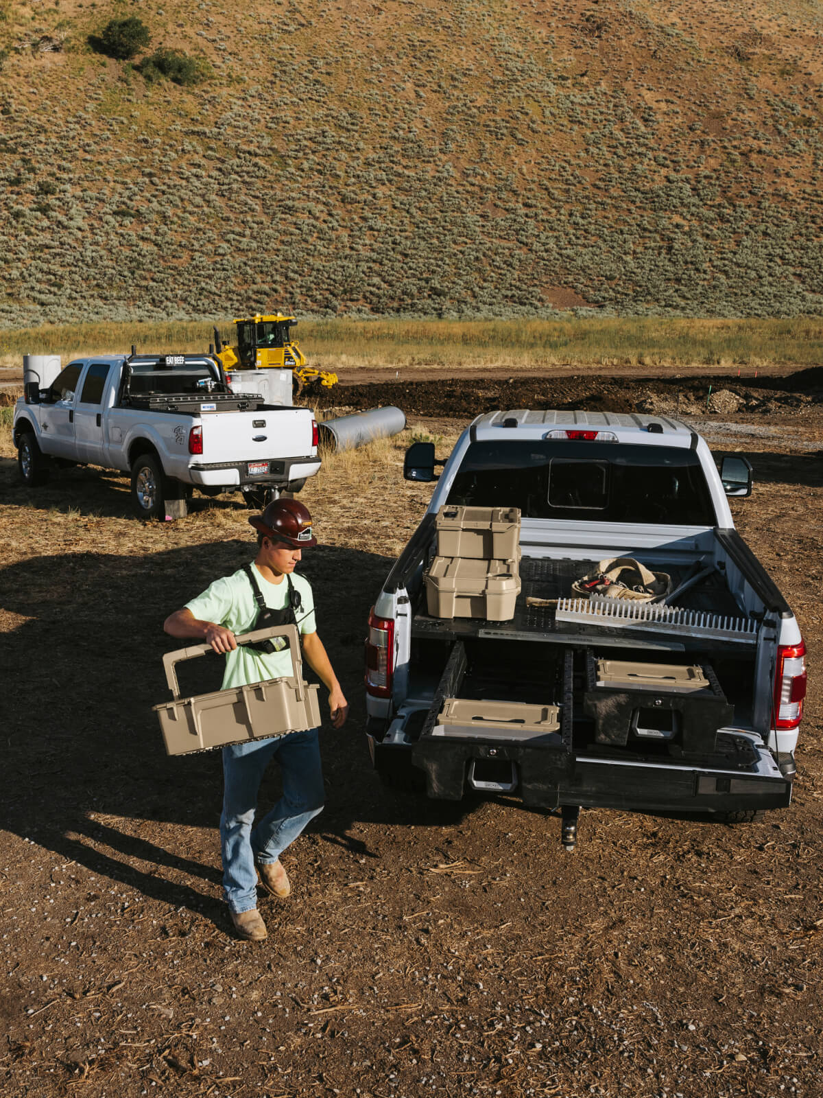 Construction worker carrying a halfrack on the jobsite