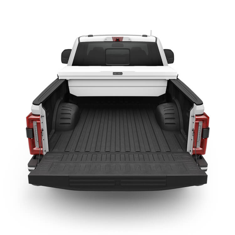 Truck bed with a White DECKED Tool Box on a white background