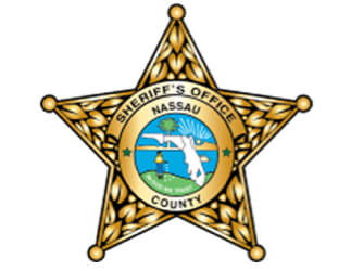 Nassau County Sheriff's Office star badge with a shield emblem on a white background