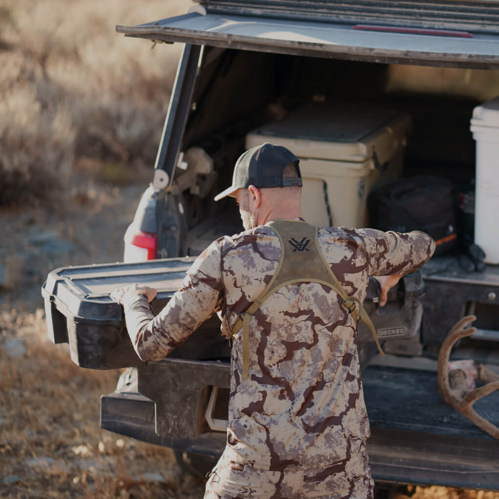 Remi Warren stowing his bow in his Decked Minuteman D-co Case.