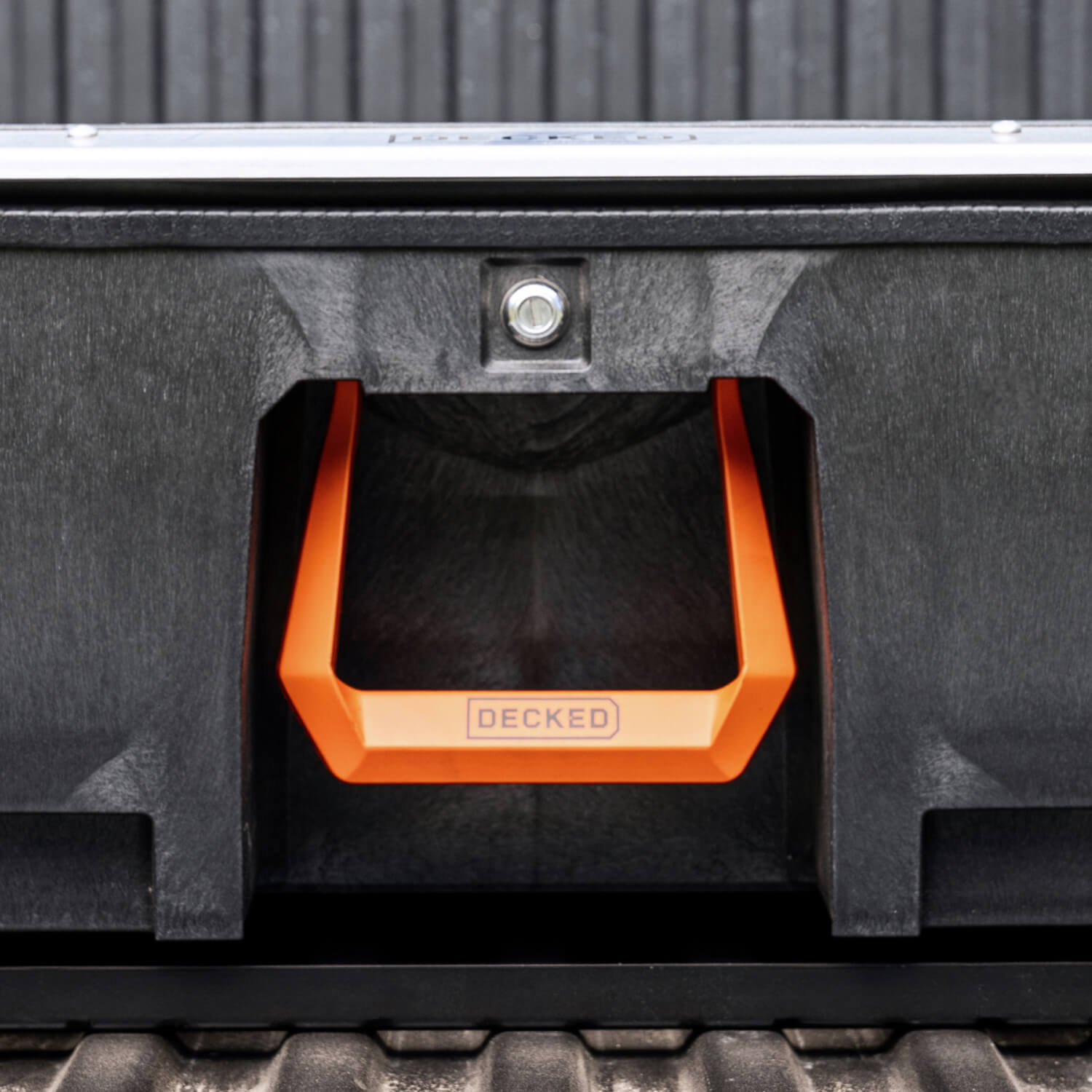 Black DECKED Drawer System with an orange 'DECKED' 'Hop Up Kit' handle.