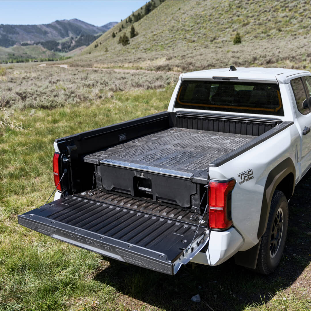 Wide angle view of the black midsize Hop Up Kit installed on a Drawer System.