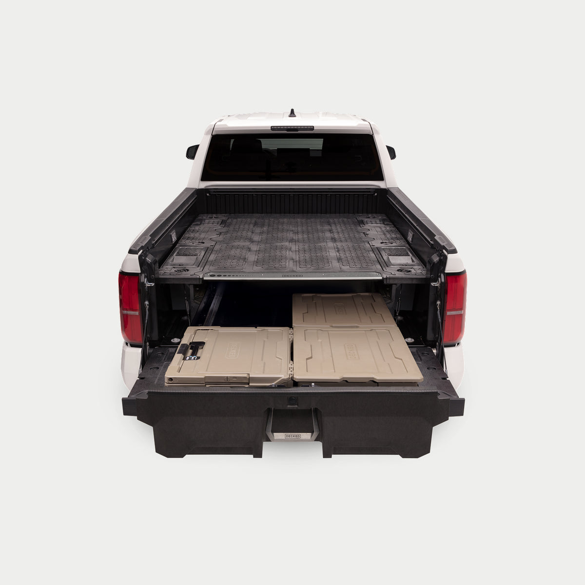 A midsize truck with a Drawer System in the bed with the single midsize drawer fully extended.