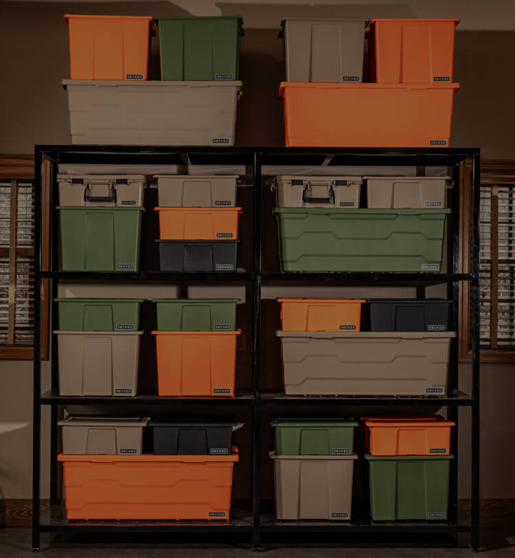 Storage shelves with colorful Payloader storage bins in a garage setting