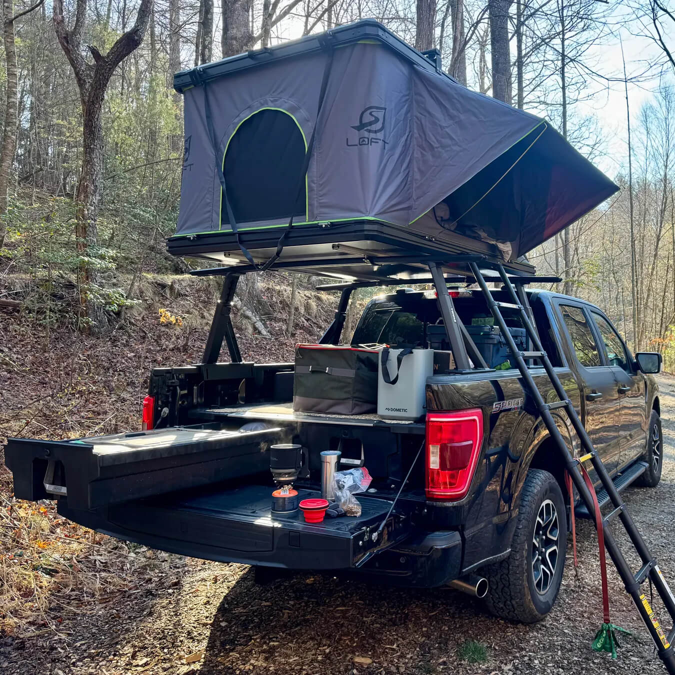 Truck camping gear guide featuring practical truck setup and storage solutions, including DECKED drawer system, in Outside Online article