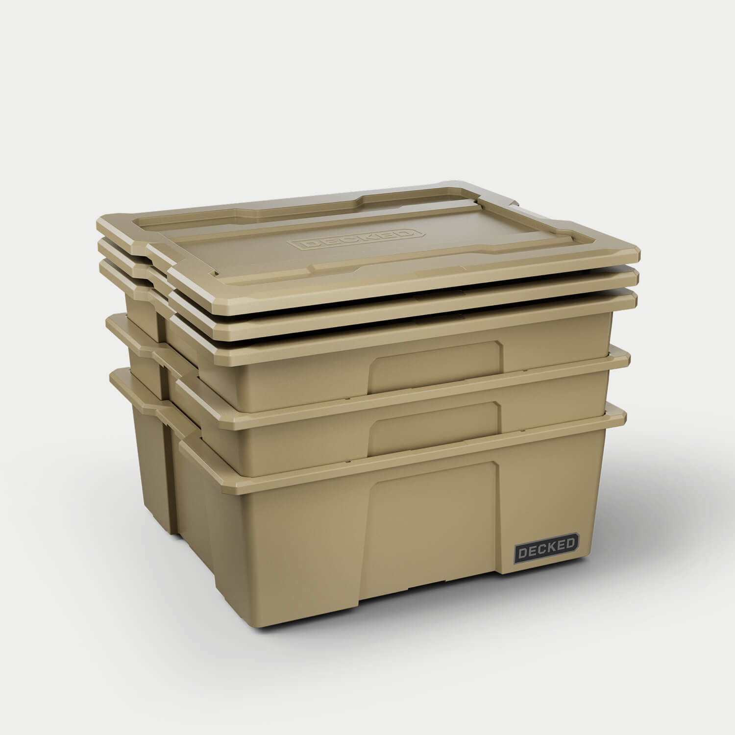 [A0040-DBIN-TAN] Three tan Payloader bins nested together with the three lids stacked on top. 
