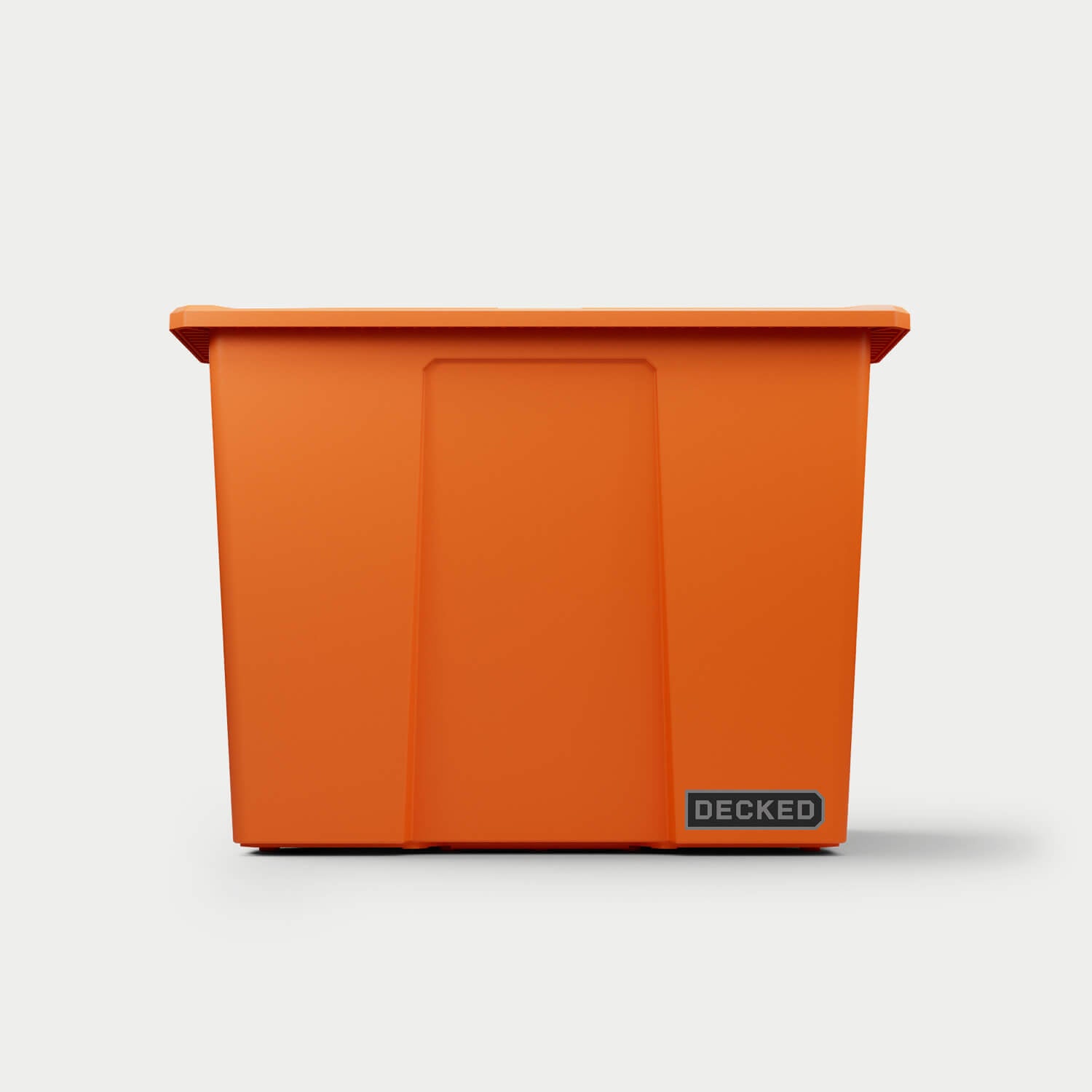 The front of one blaze orange Payloader 64 bin, closed on a white background with a DECKED logo in the bottom right hand corner of the bin.