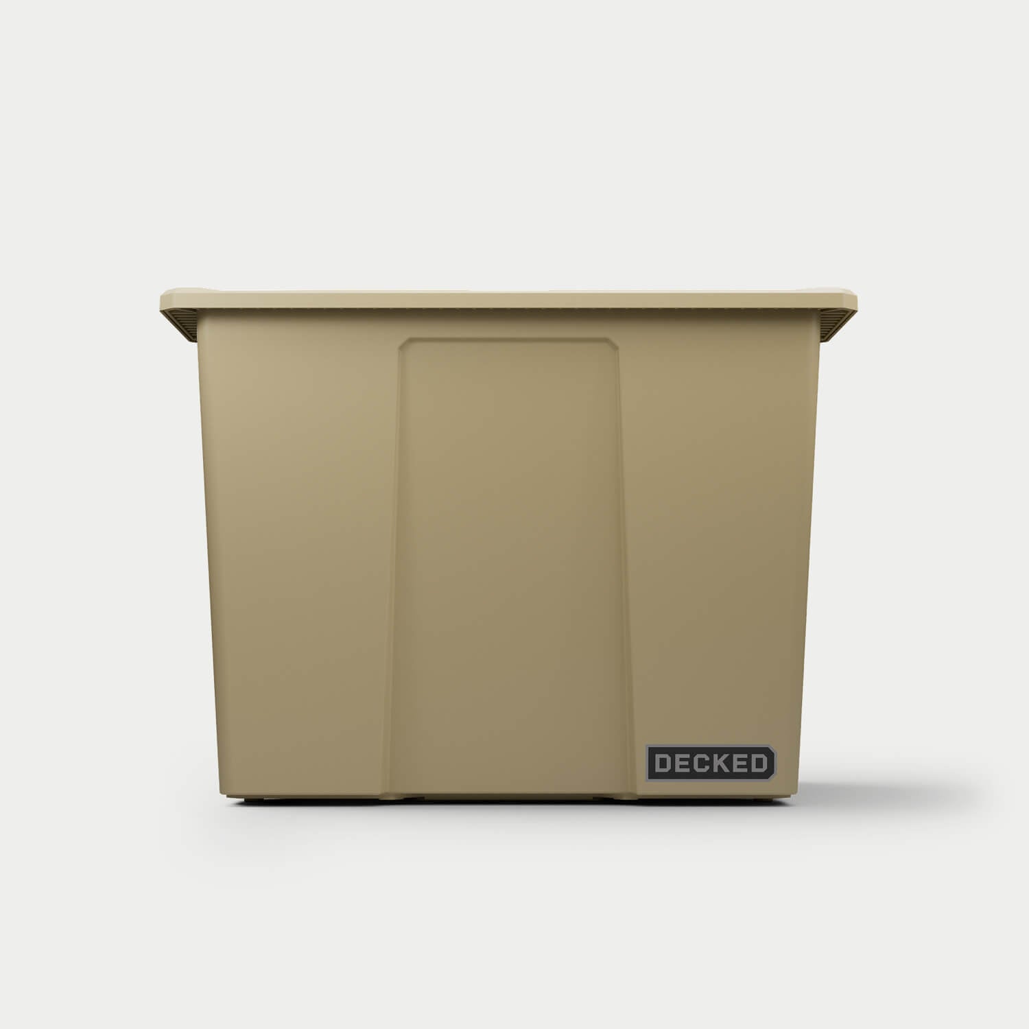 The front of one desert tan Payloader 64 bin, closed on a white background with a DECKED logo in the bottom right hand corner of the bin.