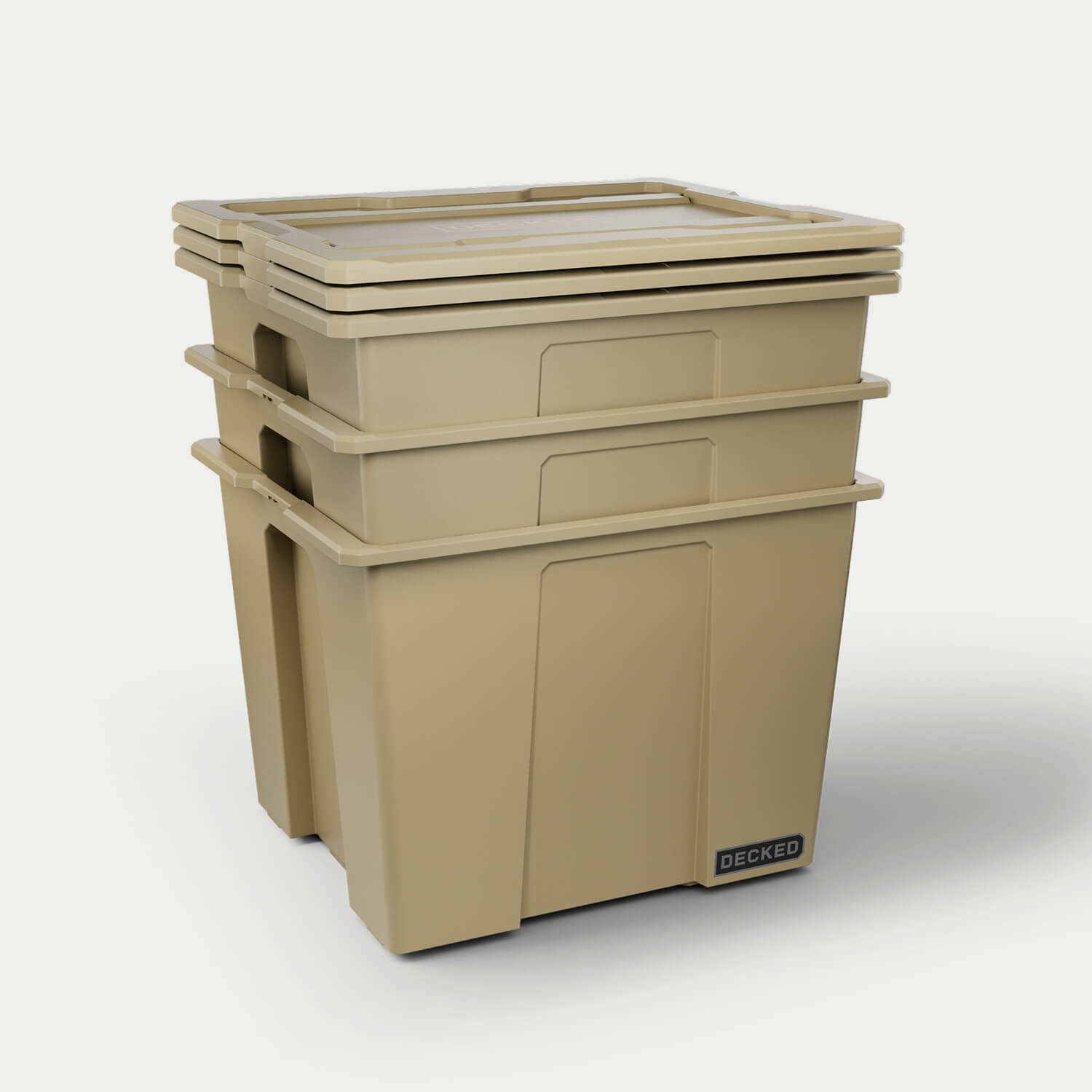 [A0043-P064-TAN] Three tan Payloader 64 liter bins nested together with the three lids stacked on top. 