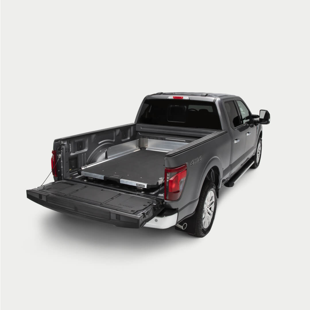 A studio shot of the CargoGlide high sides on a Full Width CargoGlide in a truck bed.