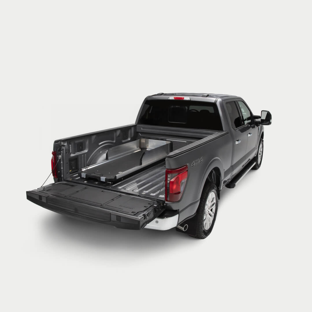 A studio shot of the CargoGlide high sides on a Half Width CargoGlide in a truck bed.