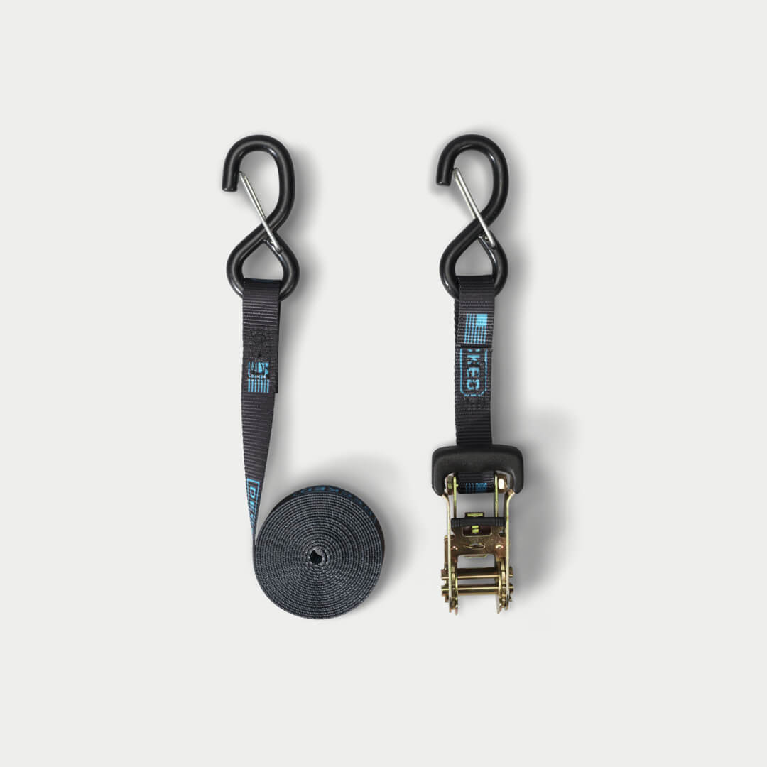 Black ratchet strap on grey background