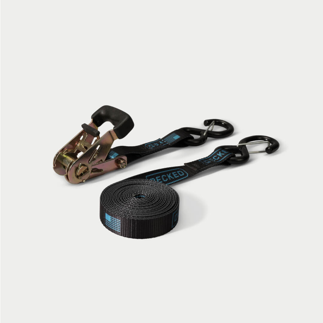 Black ratchet strap on grey background